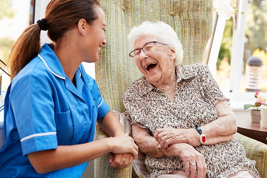 Happy Senior Woman with Nurse — Hyannis, MA — Cherry's Home Care Happy Senior Woman with Nurse — Hyannis, MA — Cherry's Home Care