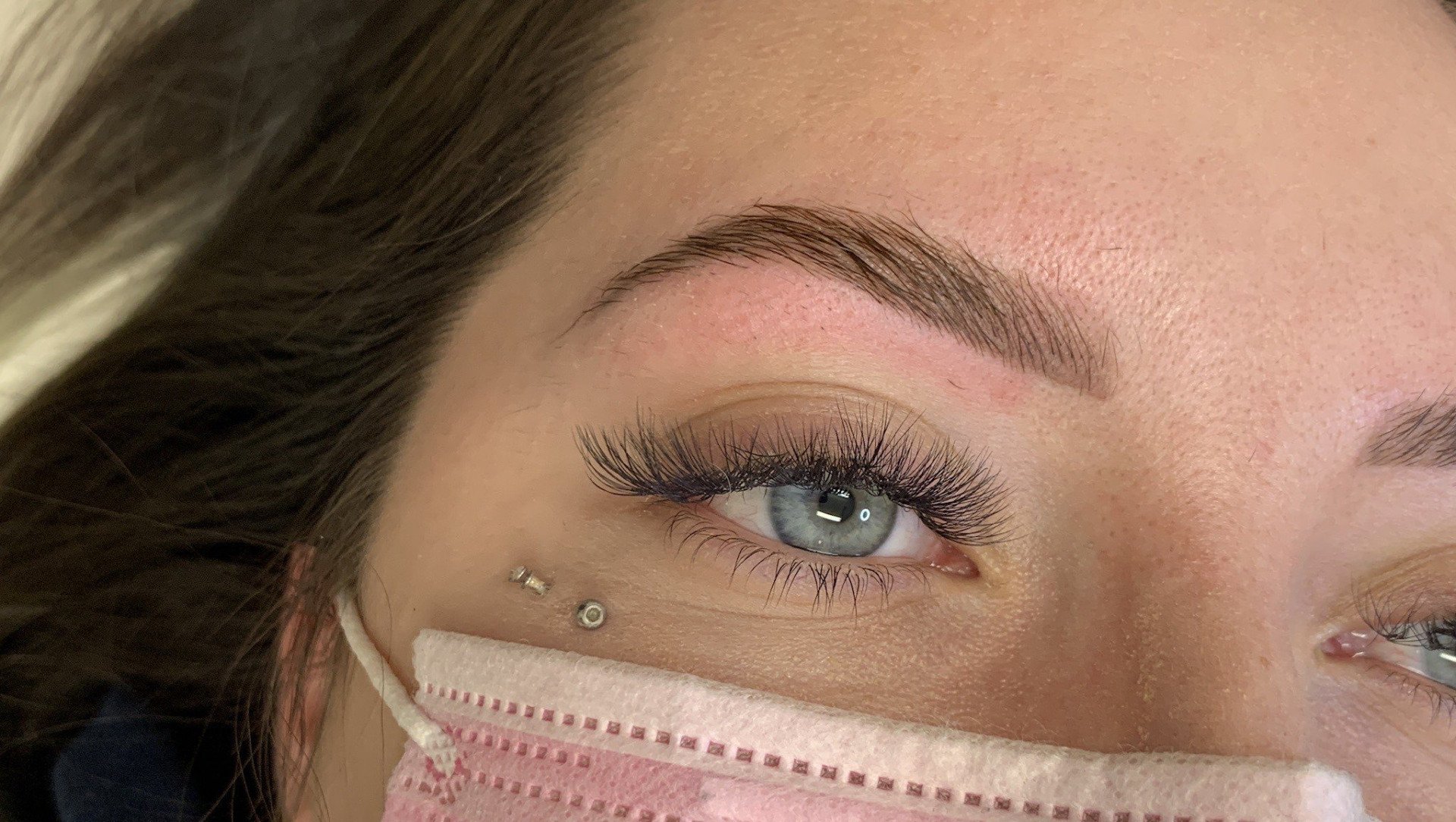 Close up view of woman's eyebrow recently treated with brow lamination