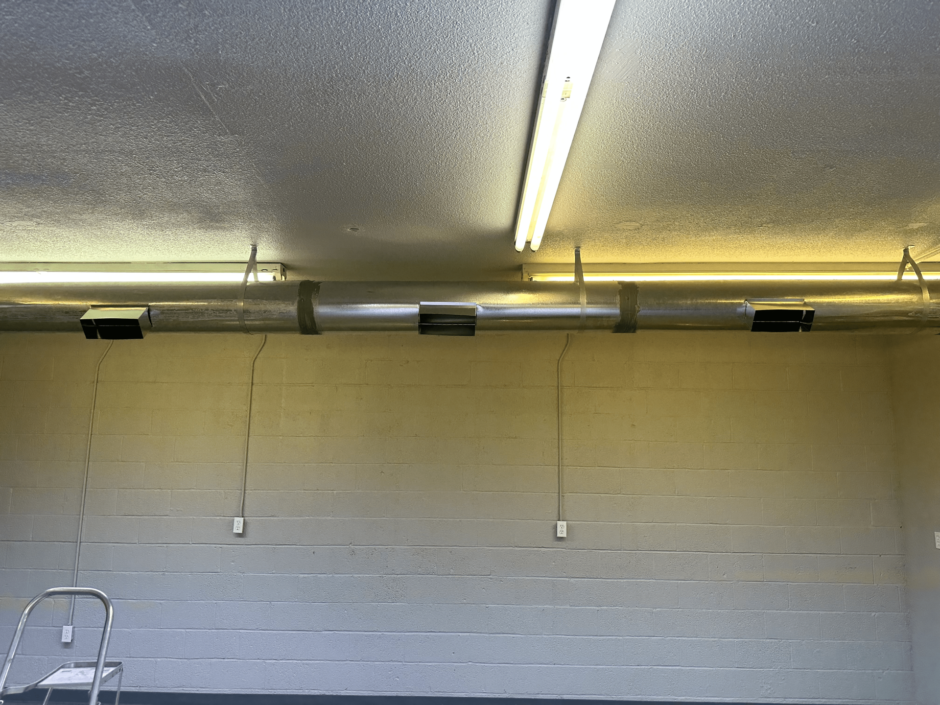 Room with a Ladder and a Lot of Lights on the Ceiling — Broomfield, CO — Anytime Heating and Cooling LLC