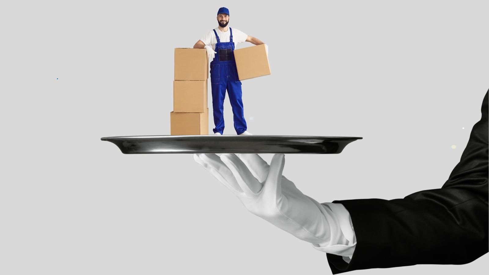 Mover standing on serving tray with white gloved hand