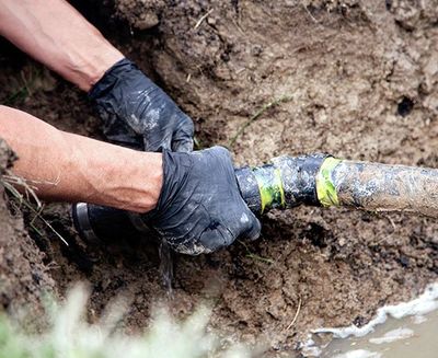 Repairing A Broken Pipe — Rocky Mount, NC — Boswell & Son Septic Tank Service Inc.