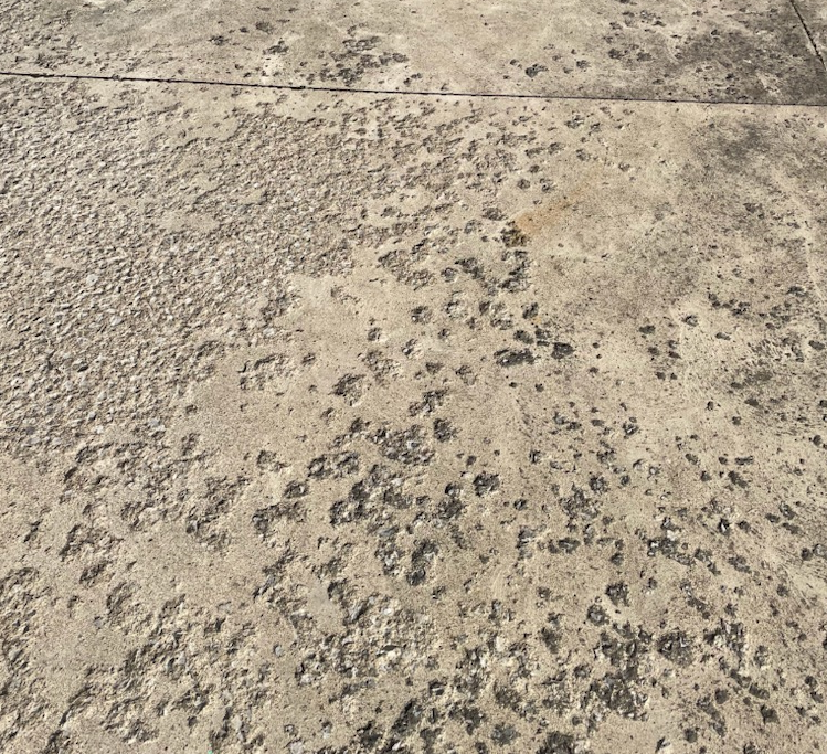 Spalling damage from the freeze-thaw cycle, a process that sealing concrete prevents - By Ameriseal