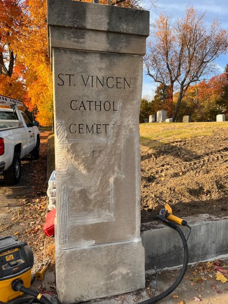 Entrance stone of St. Vincent Catholic Cemetery in Akron Ohio - Repairs done by Ameriseal and Restoration