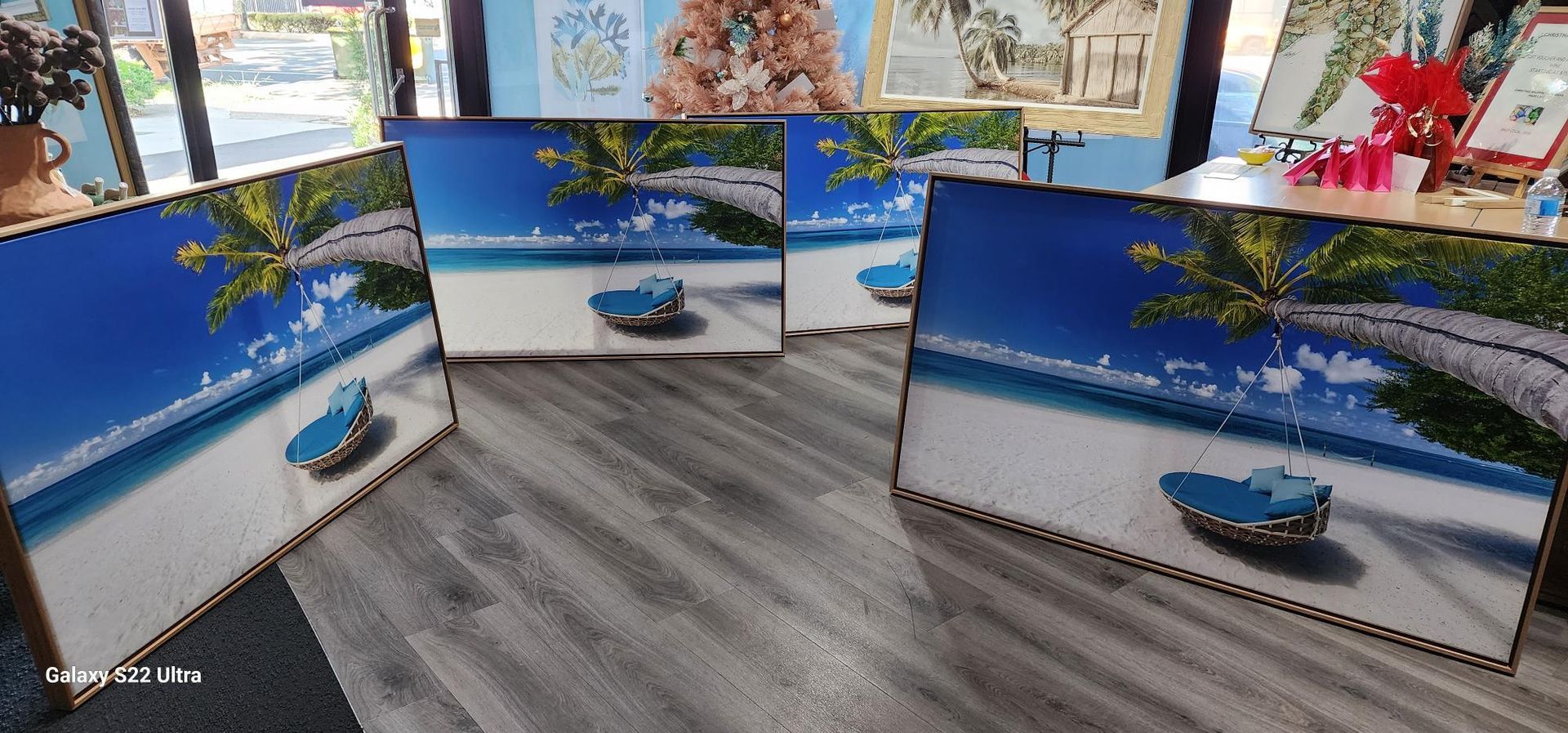 Abstract Painting With Colourful Leaf Shapes on a Blue Background — Tropical North Framing Gallery Cairns in Cairns, QLD