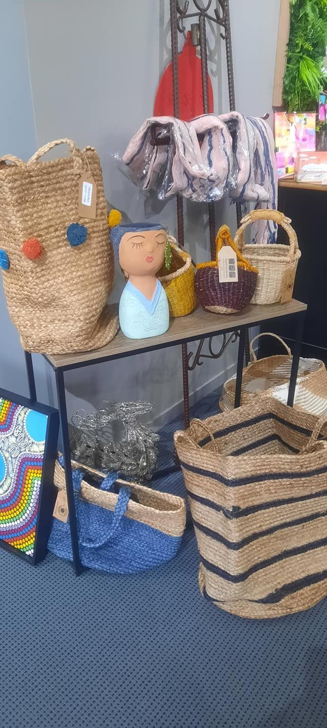 Display of Various Woven Baskets and Decorative Items on Shelves — Tropical North Framing Gallery Cairns in Cairns, QLD