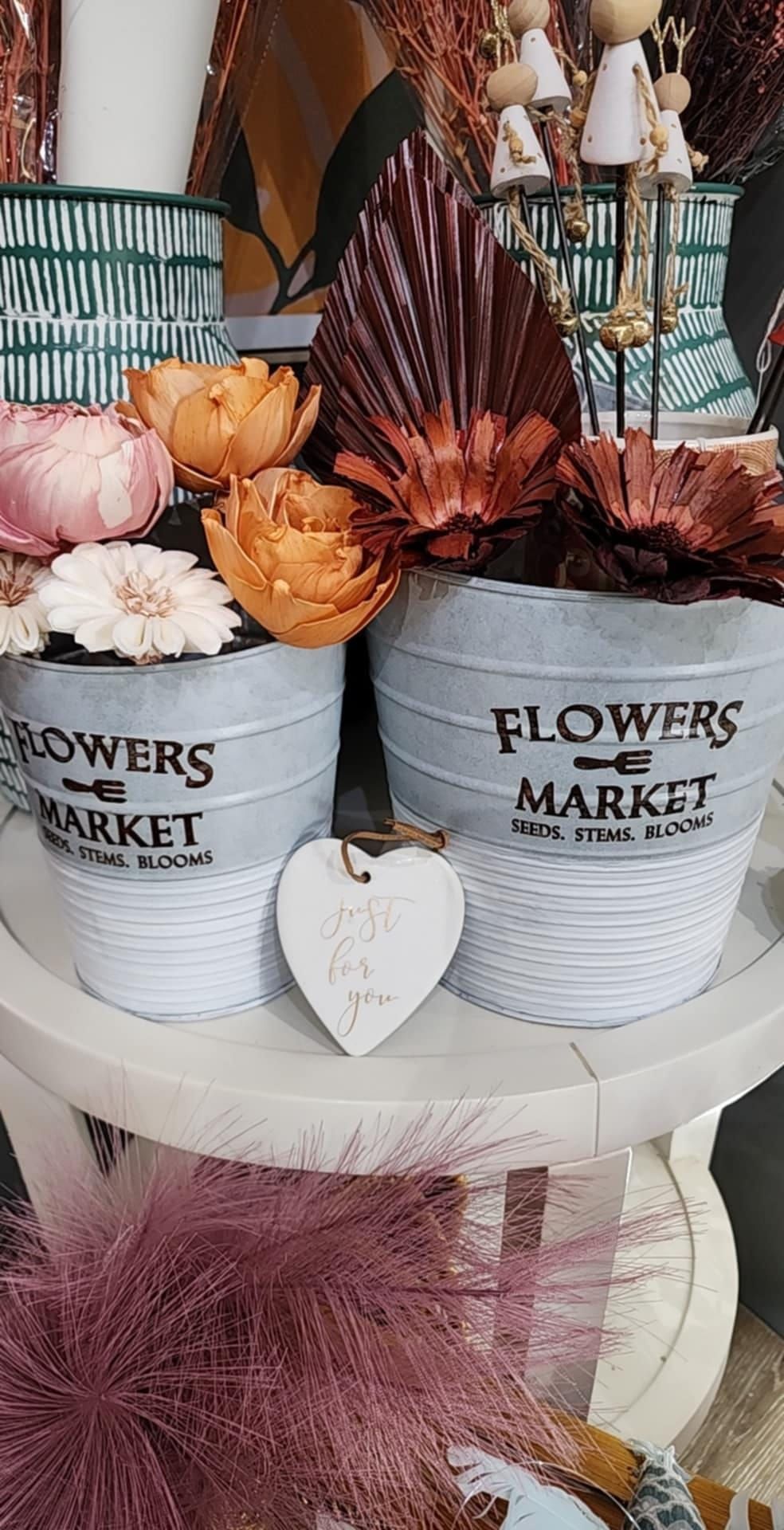 Two White Flower Pots Filled With Flowers and a Wooden Heart — Tropical North Framing Gallery Cairns in Cairns, QLD
