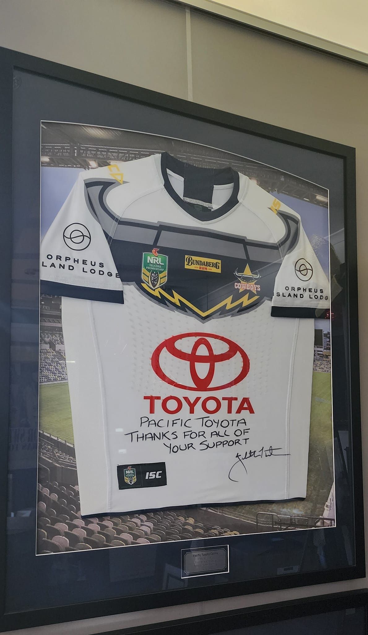 Framed North Queensland Cowboys Jersey With Toyota Logo and Signatures — Tropical North Framing Gallery Cairns in Cairns, QLD