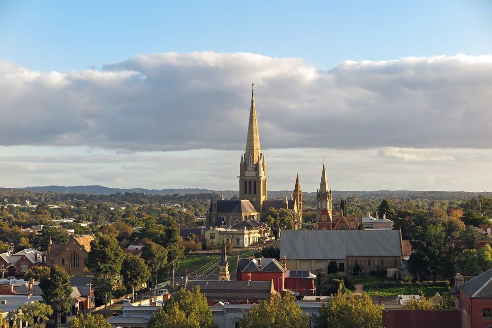 An Aerial View of a City With a Large Church in the Distance — Bellarine Removals In Bendigo, VIC