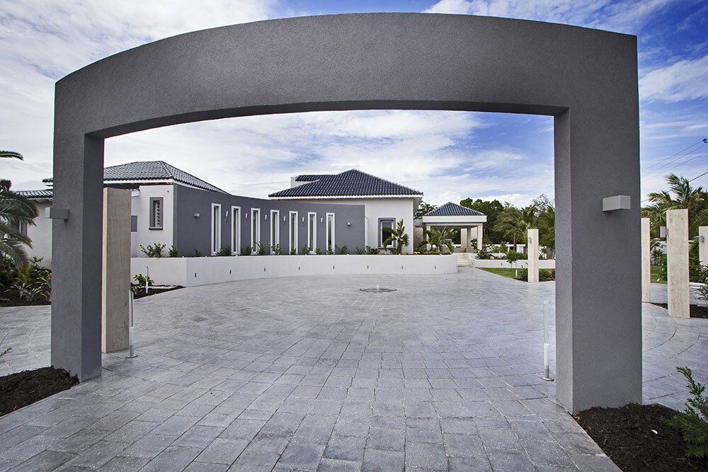 A large house with a driveway leading to it