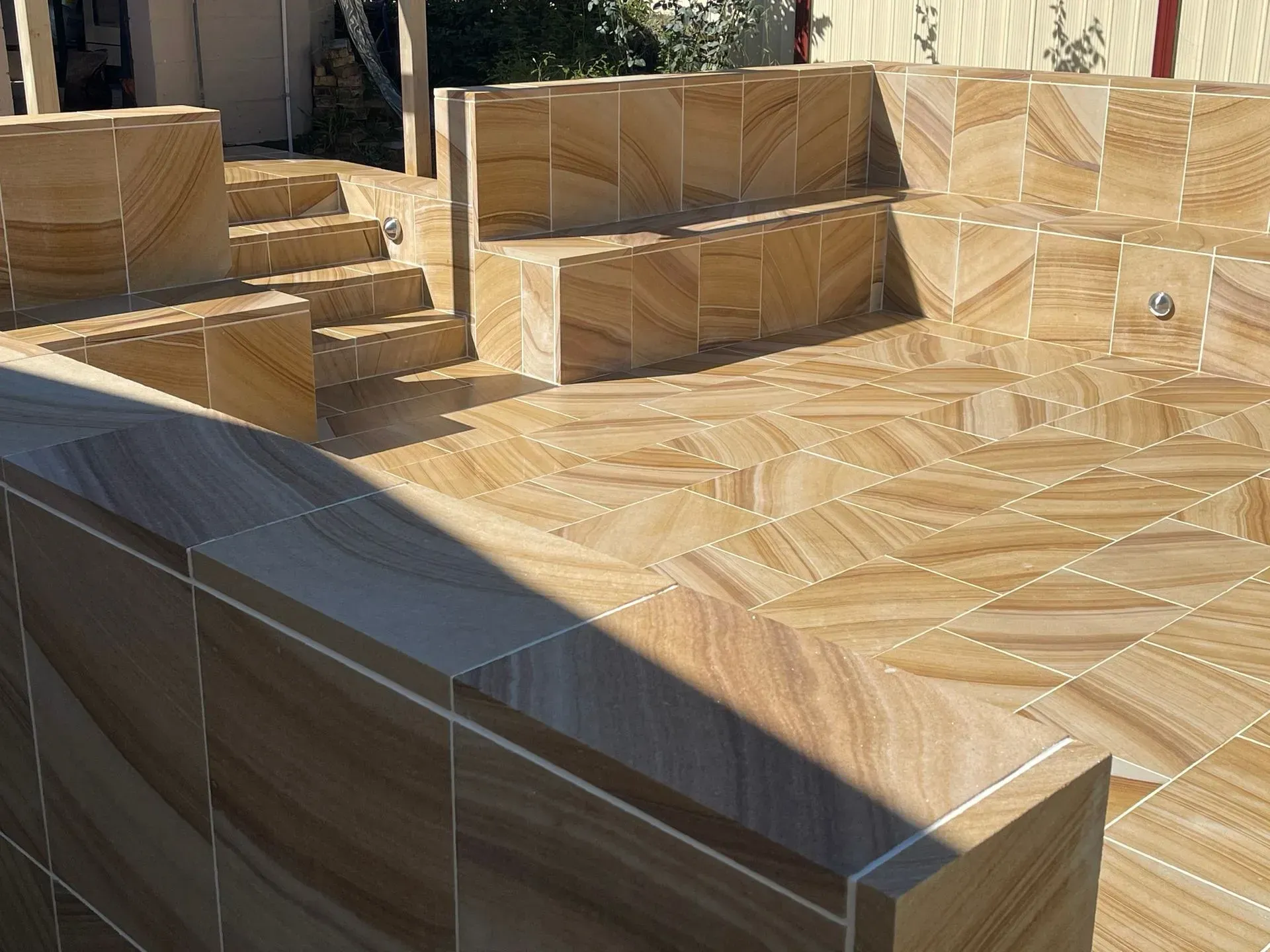 Pool With Blue Water in Front of a House — Divine Landscape Creations in Berkeley Vale, NSW