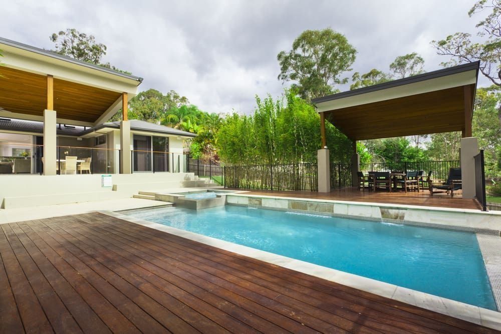 Poolside View of Modern Home — Divine Landscape Creations in Berkeley Vale, NSW