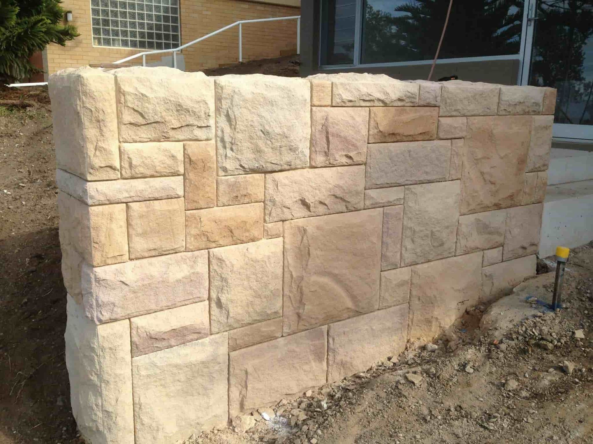 Beige Sandstone Retaining Wall — Divine Landscape Creations in Berkeley Vale, NSW