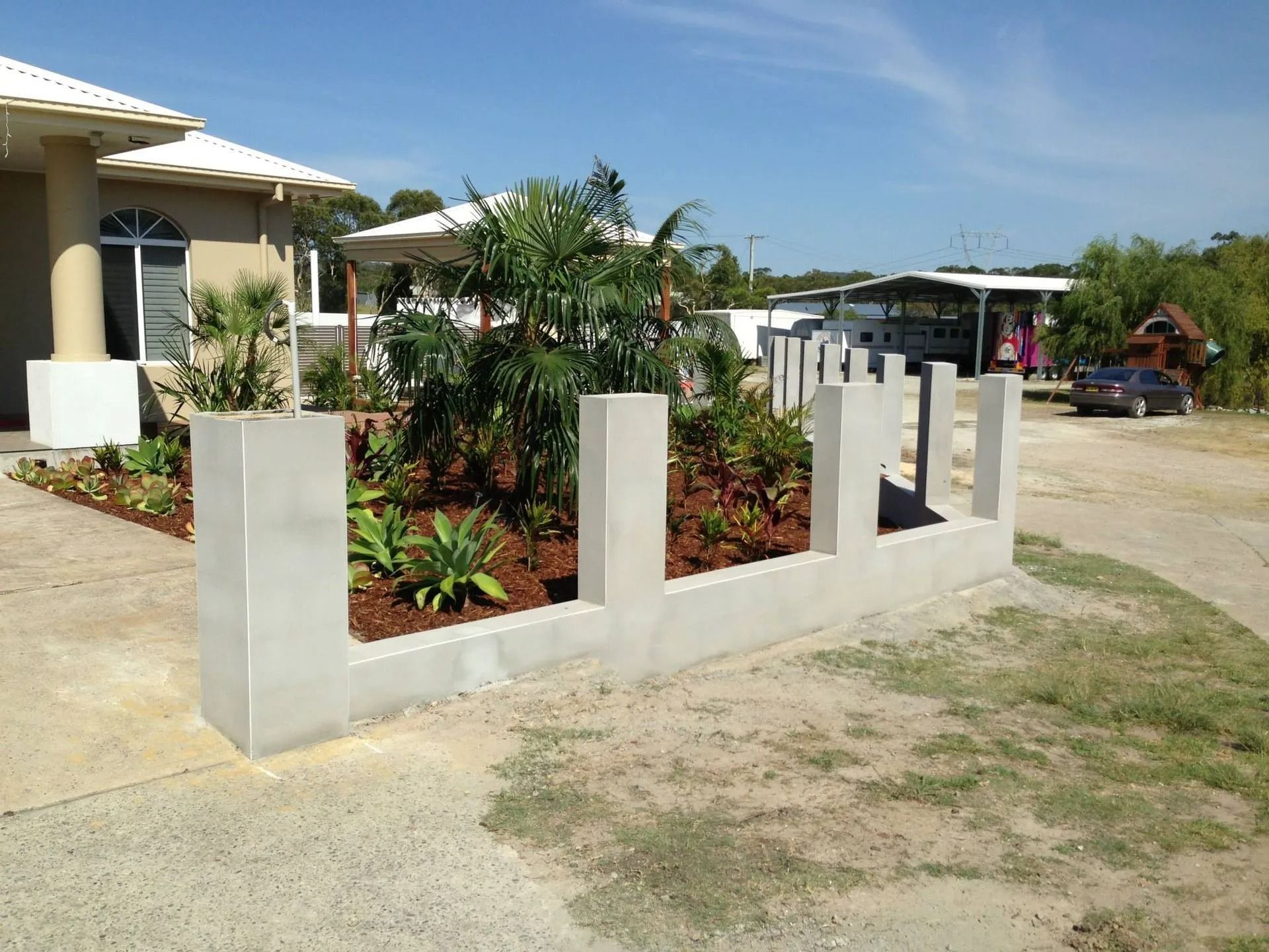 Low Concrete Wall — Divine Landscape Creations in Tuggerah, NSW