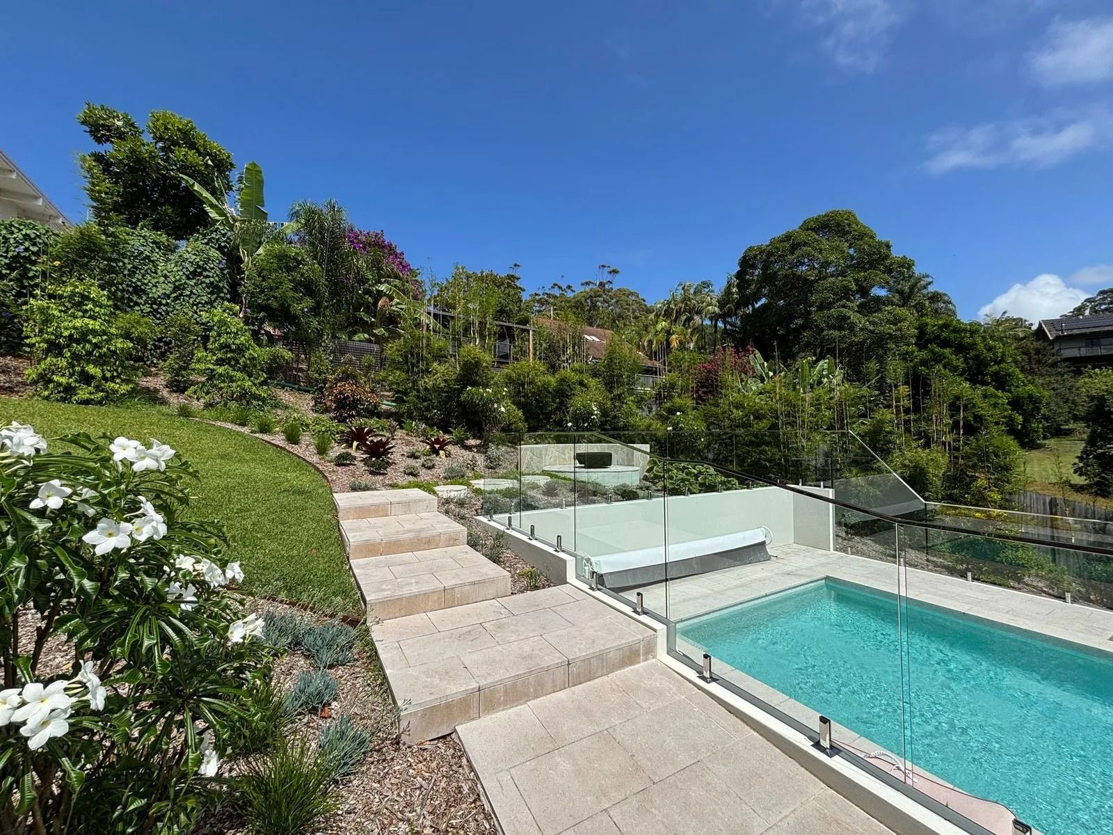 Swimming Pool Next to Steps Leading Up a Hillside — Divine Landscape Creations in Berkeley Vale, NSW