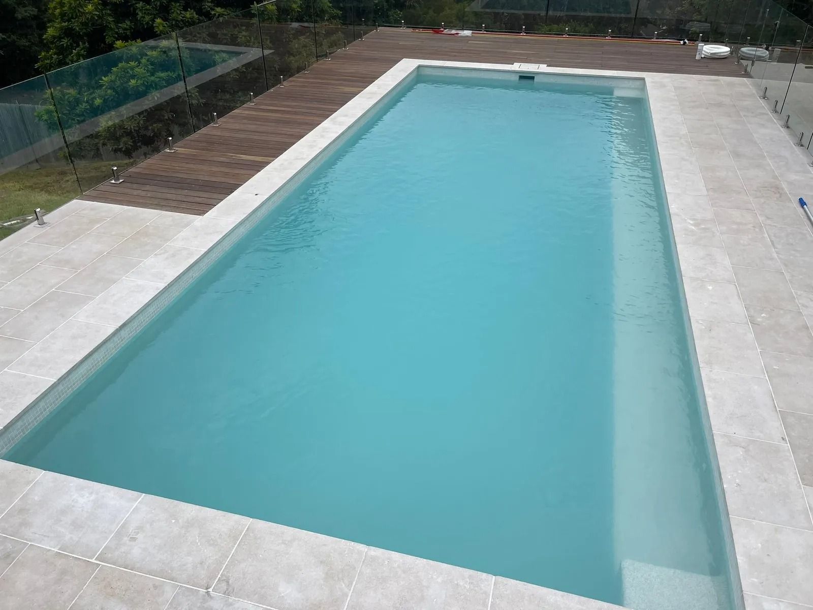 Rectangular Swimming Pool Filled With Turquoise Water — Divine Landscape Creations in Berkeley Vale, NSW