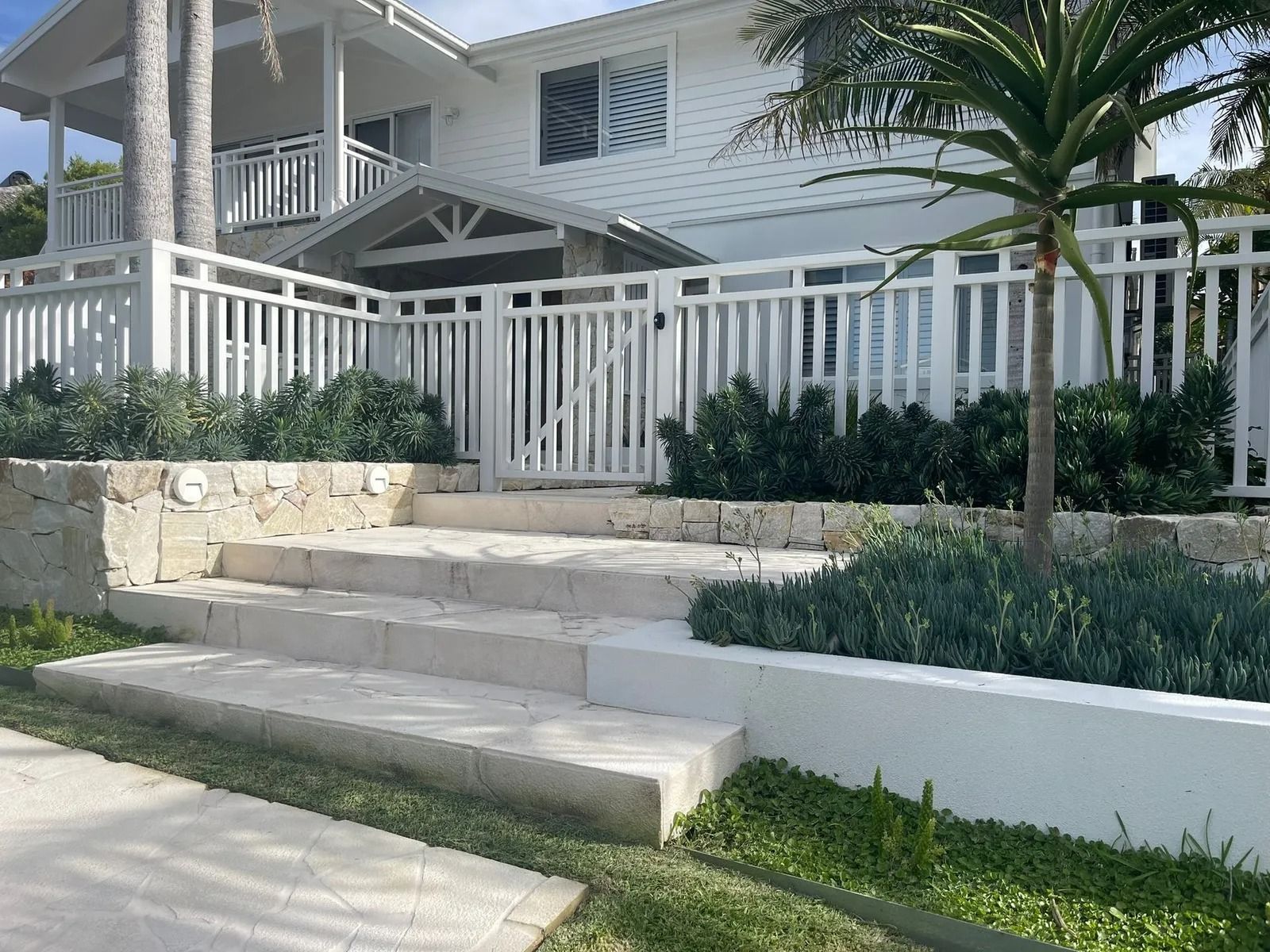 White House With a Fenced Yard — Divine Landscape Creations in Berkeley Vale, NSW