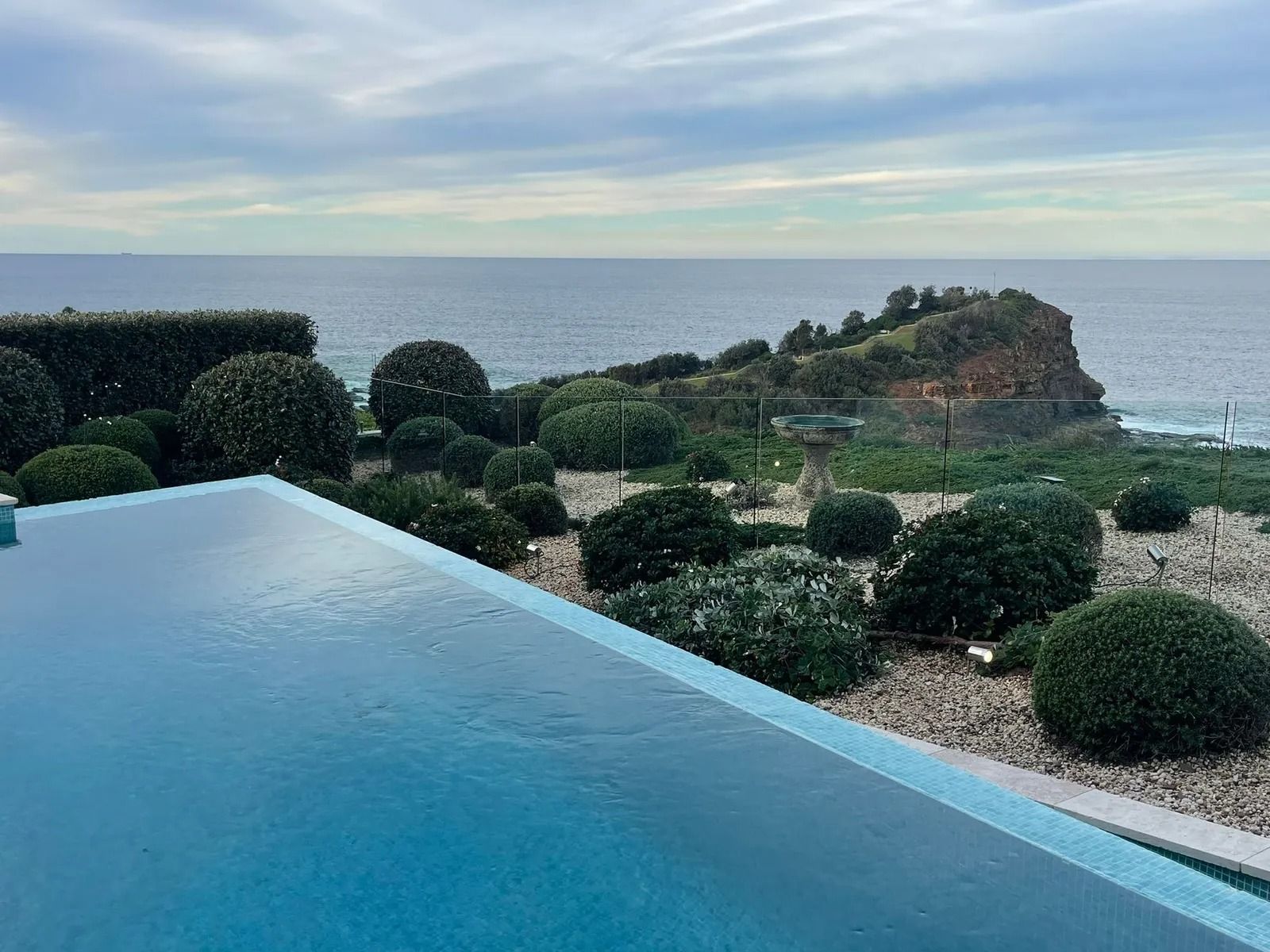 Infinity Pool Overlooking Ocean, Cloudy Sky — Divine Landscape Creations in Berkeley Vale, NSW
