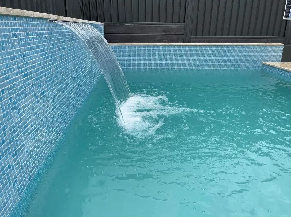 Small Pool With Blue Tiled Walls — Divine Landscape Creations in Matcham, NSW