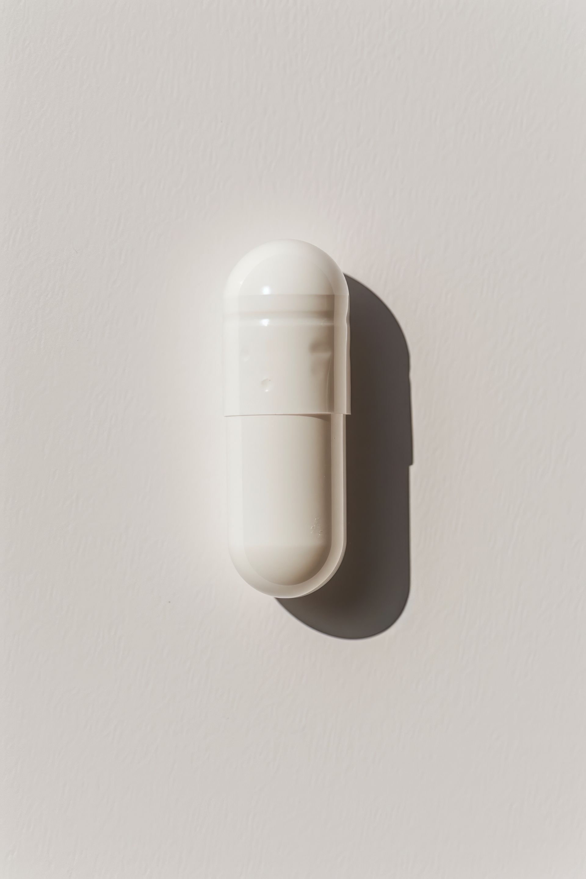 There are many different types of pills on the table.