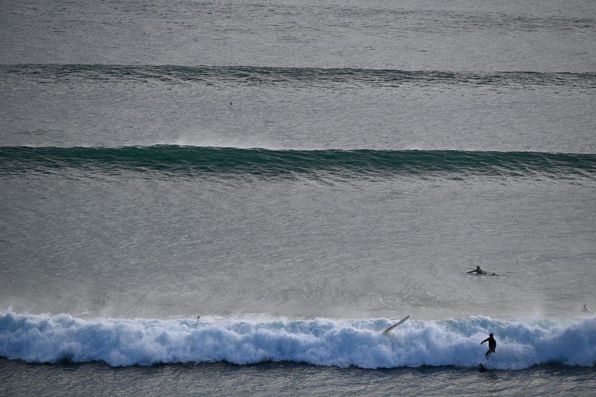 Original image of a surfer at Kirra beach. 