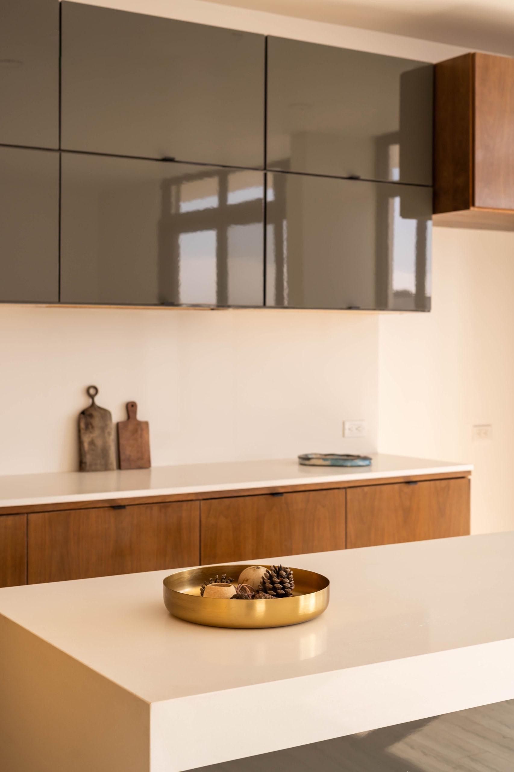 A kitchen with a tray of grapes on the counter