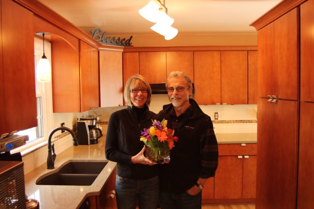 Couple In Their Kitchen — Kentwood, MI — Cardinal Remodeling and Design LLC