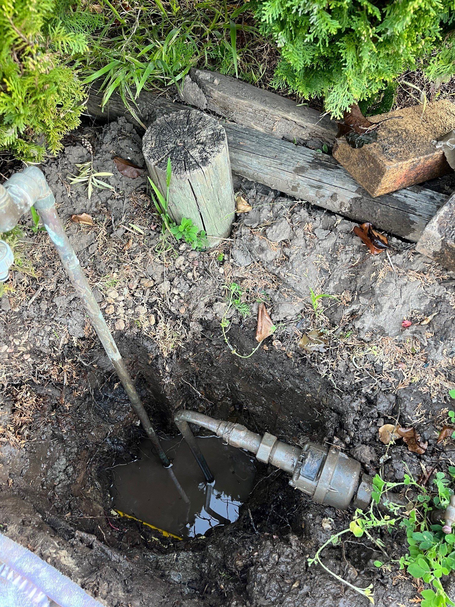 Male Plumber Makes Wiring Of Sewer Pipes — Distinct Plumbing Services In Barrack Heights NSW