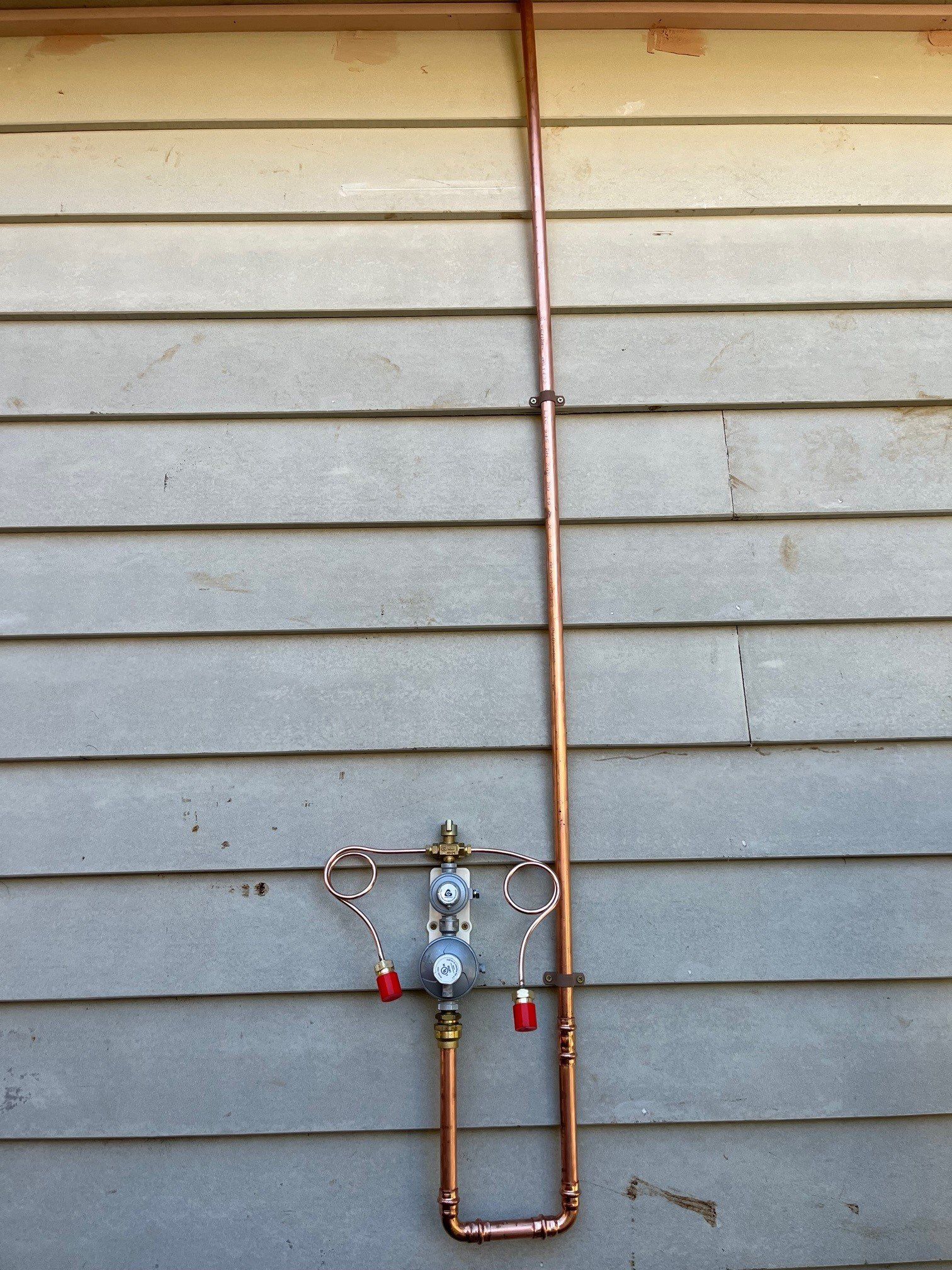 Plumber Fixing Water Tap In A Bathroom Using Spanner — Distinct Plumbing Services In Barrack Heights NSW