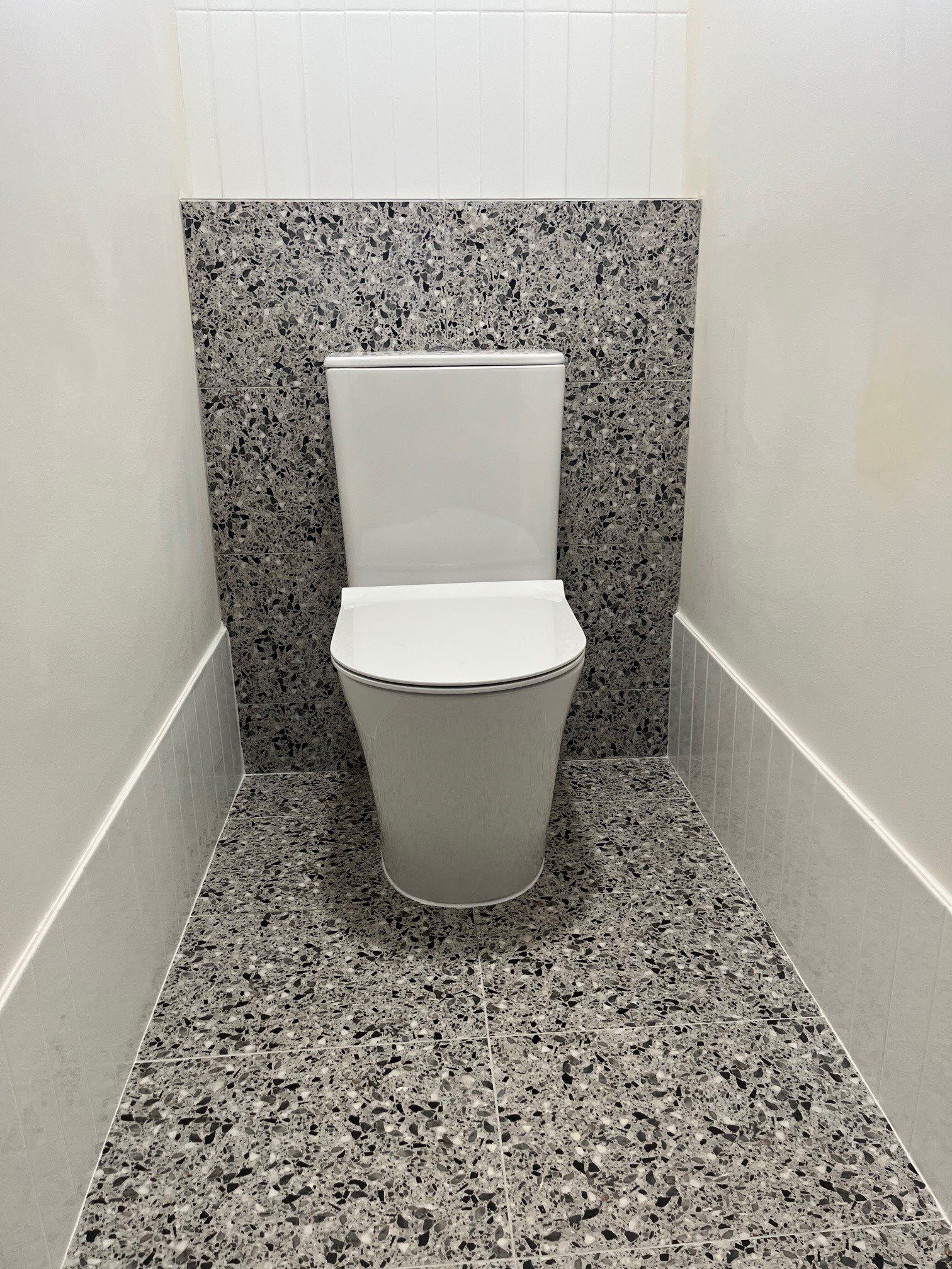 Plumber Repairing The Hot Water Heater — Distinct Plumbing Services In Barrack Heights NSW