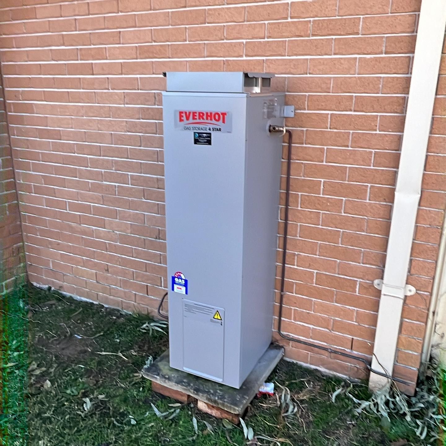 Plumber Repairing in Hot Water Systems — Distinct Plumbing Services In Dapto, NSW