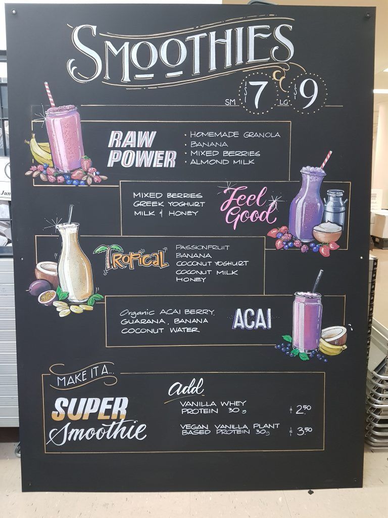 A blackboard with smoothies written on it