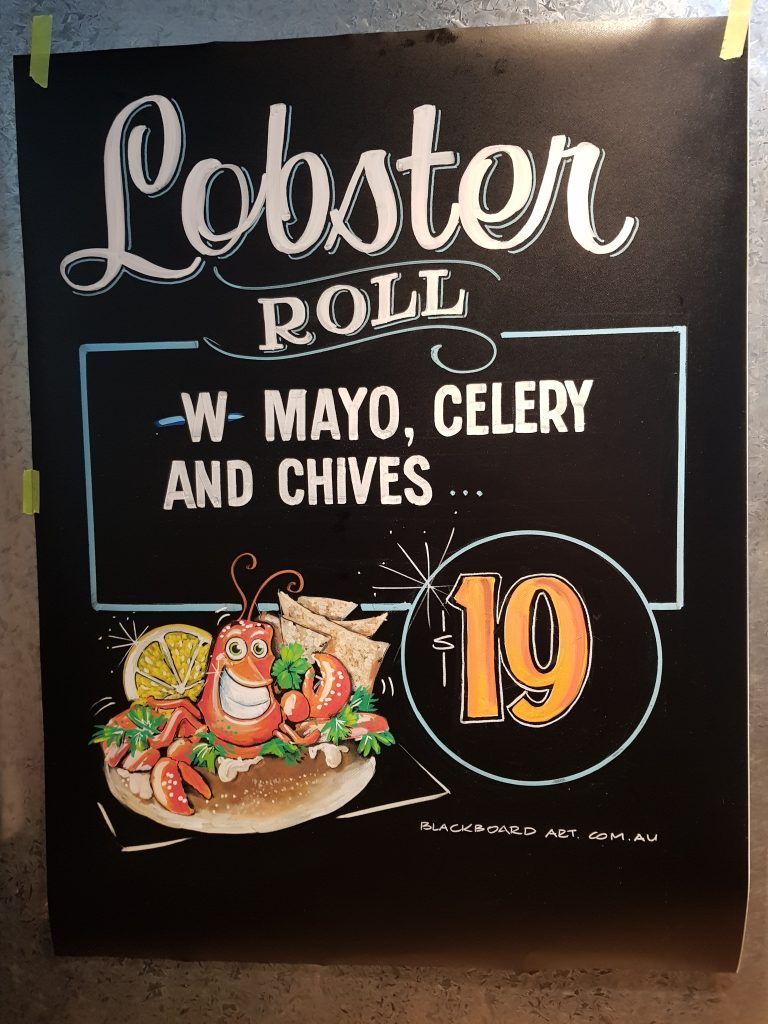 A lobster roll with mayo celery and chives for $ 19