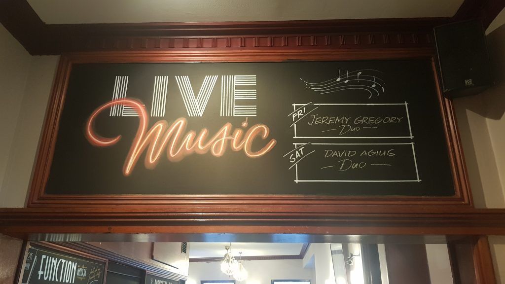 A blackboard with the words save music written on it