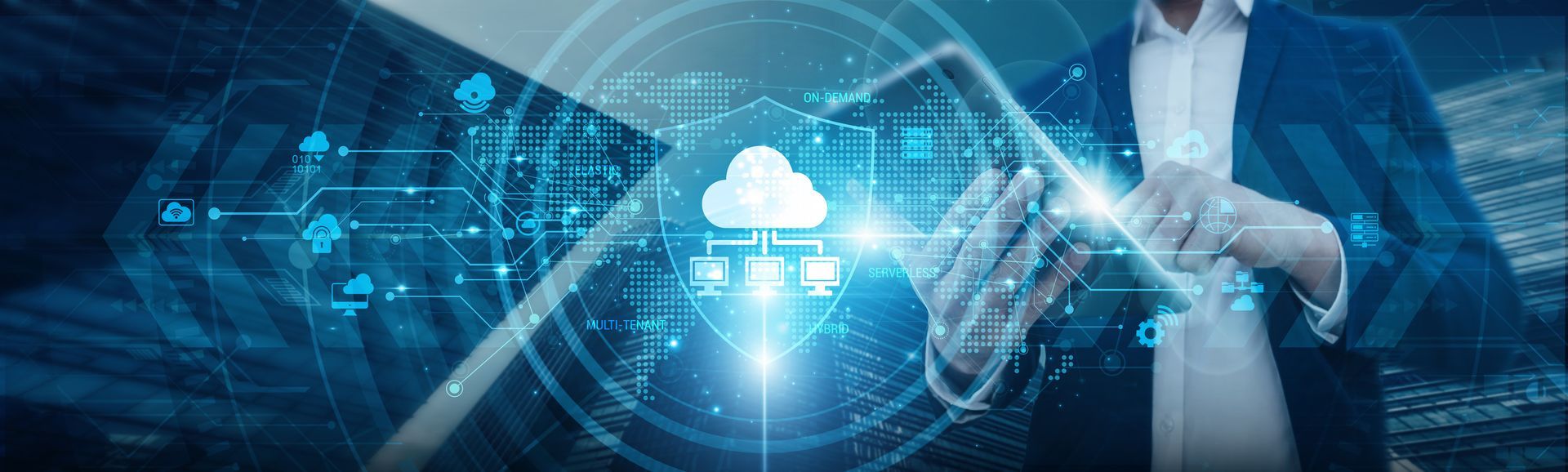 Person holding a tablet with a cloud computing graphic overlaid. Blue and white tones, futuristic.