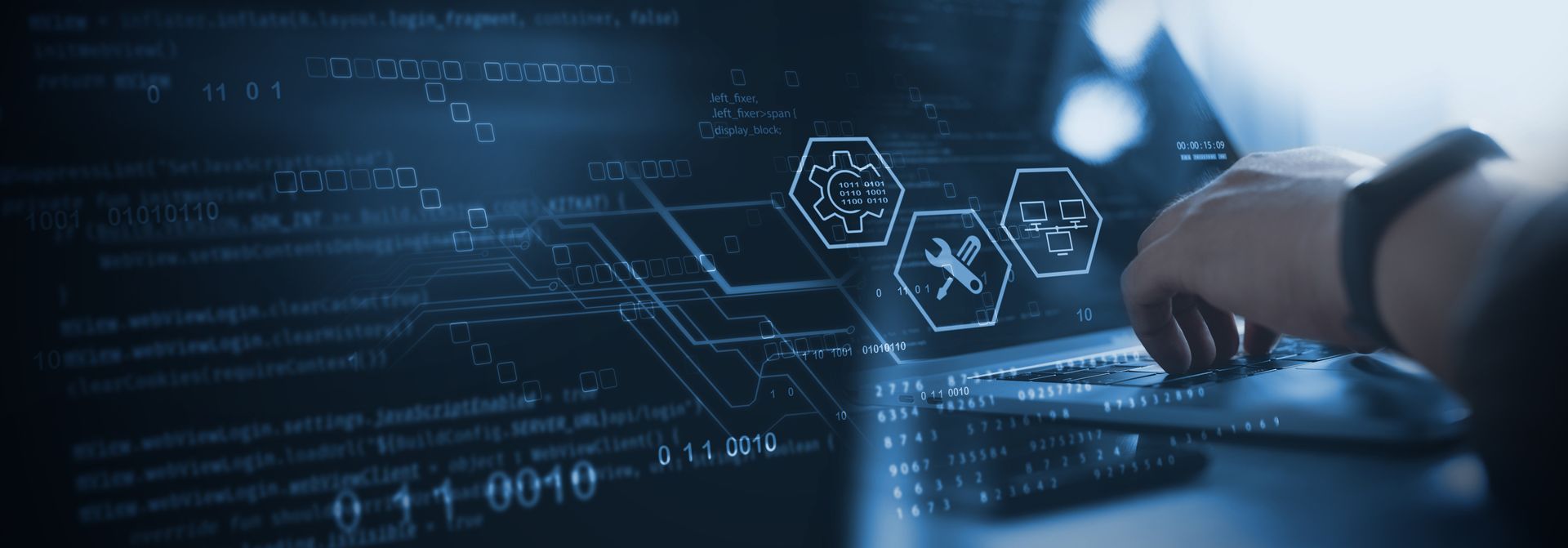 Person typing on laptop with digital interface, featuring hexagonal icons and code snippets.