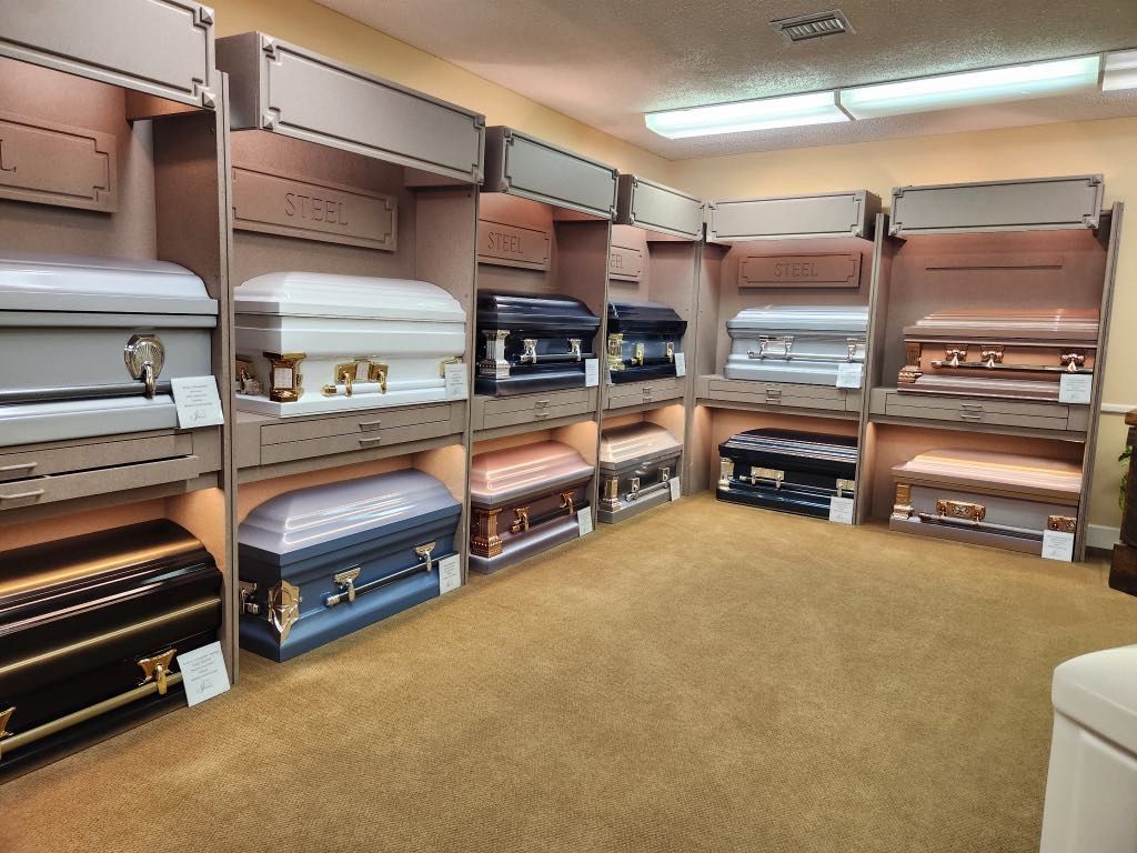 There are many different types of coffins in this room.