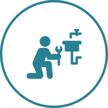 A plumber is fixing a sink with a wrench.