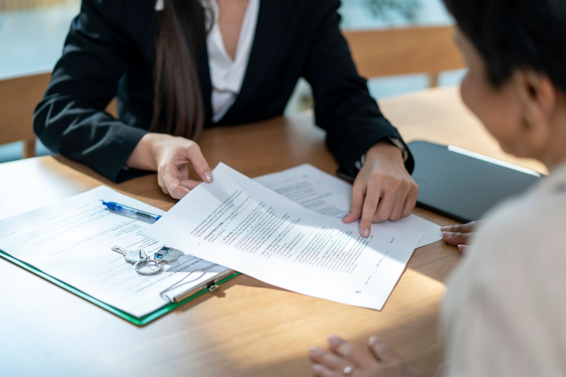 Real estate agents offer contracts to buy or rent housing.