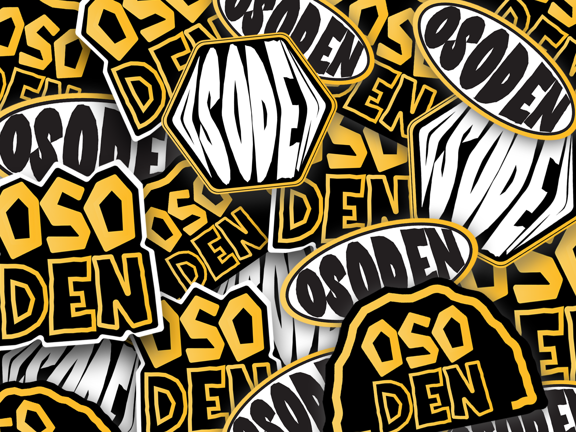 A bunch of stickers with the word den on them