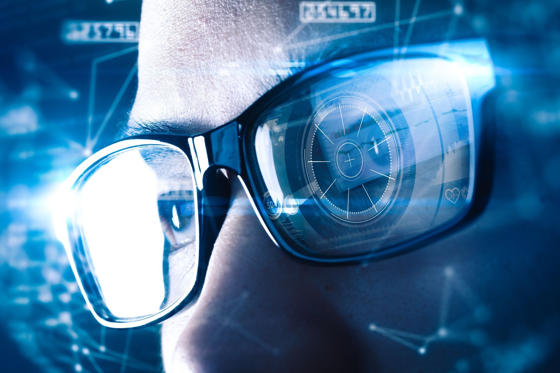 A close up of a person wearing futuristic glasses