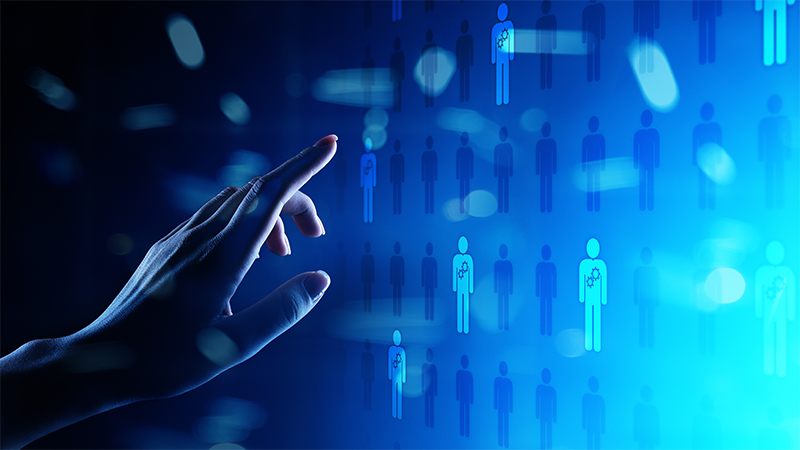 A hand is pointing at a group of people on a blue background.