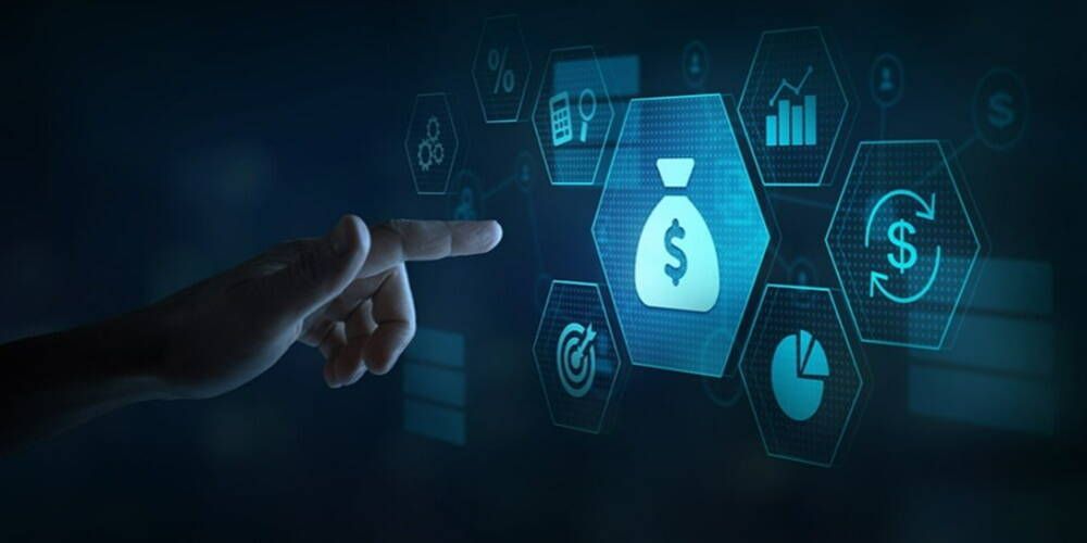 A person is pointing at a bag of money on a screen.