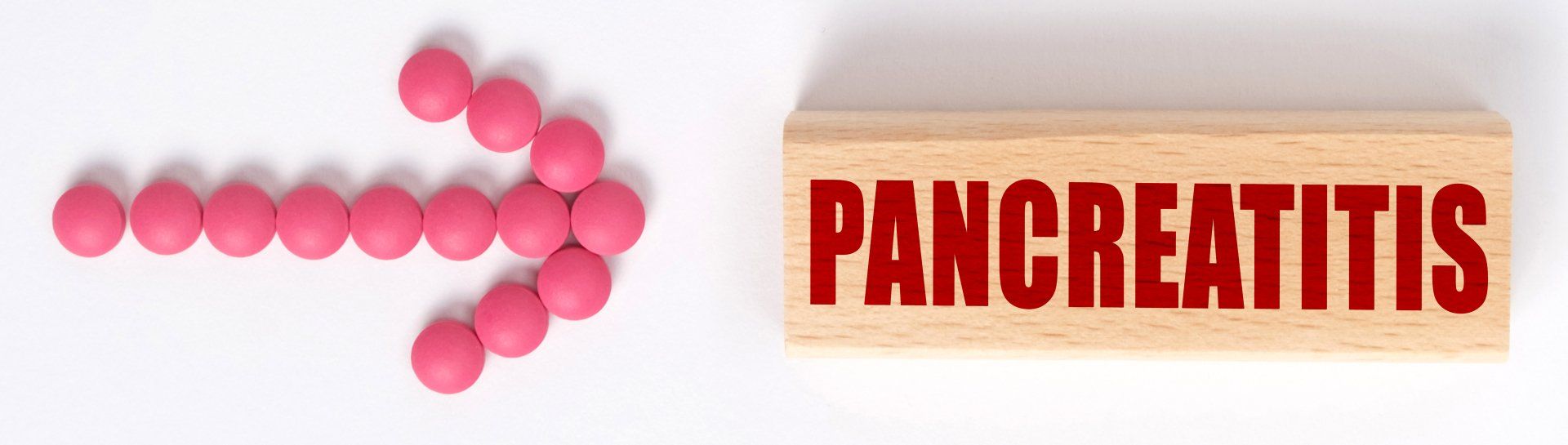 arrow of medicine pointing to a Pancreatitis sign