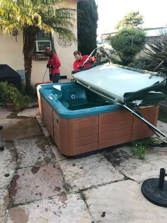 hot tub being removed