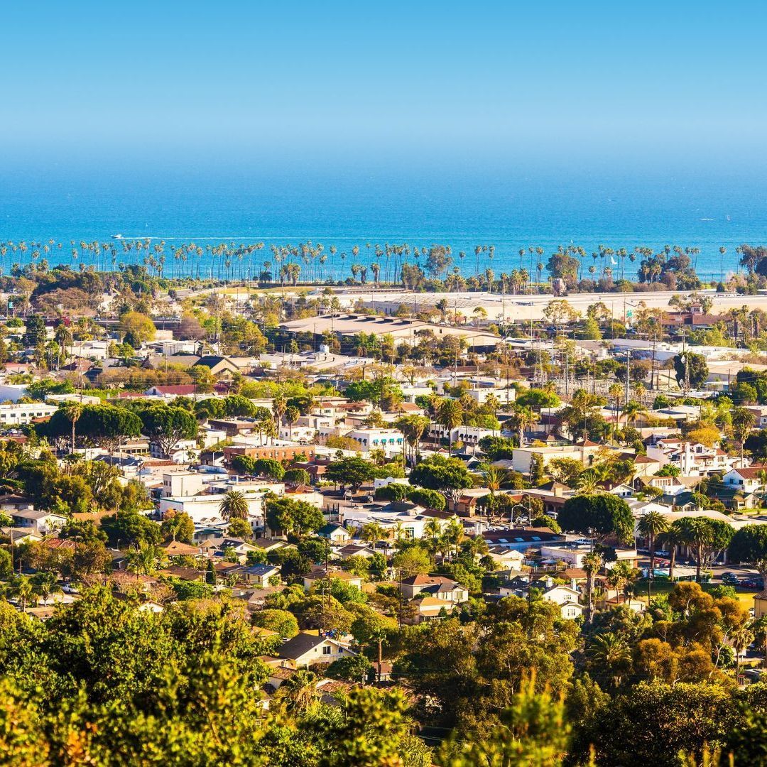 an aerial view of a Santa Barbara with a beach in the background.