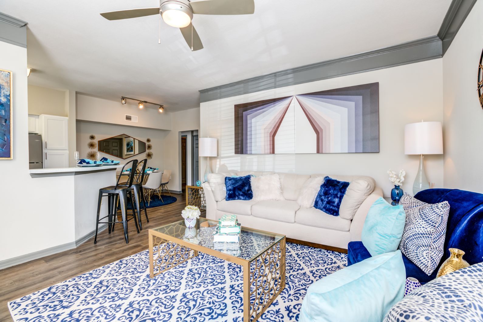 Living Room with Ceiling Fan at Burano Hunter's Creek Apartment