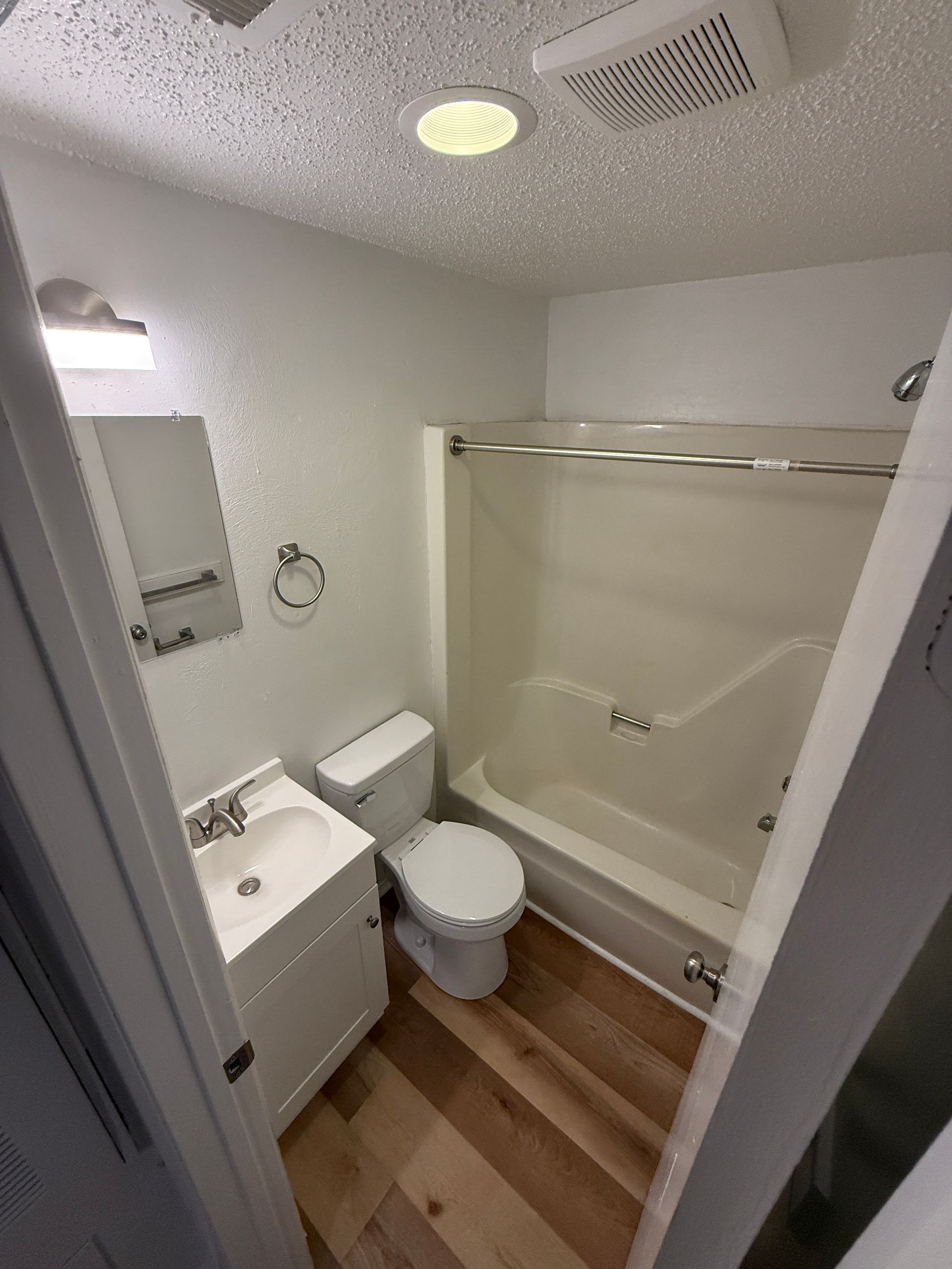 updated bathroom  with new vanity and floors