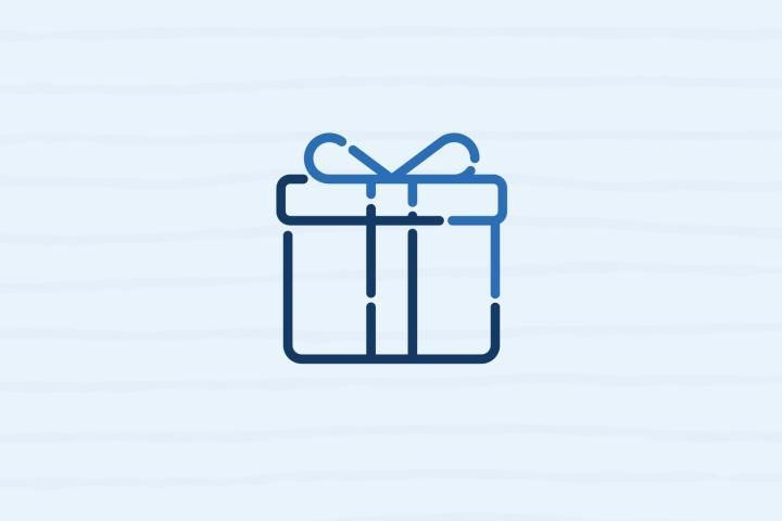 A blue gift box with a bow on a white background.