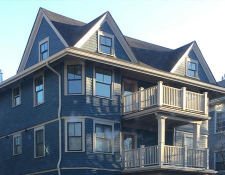 A large house with a balcony on the second floor