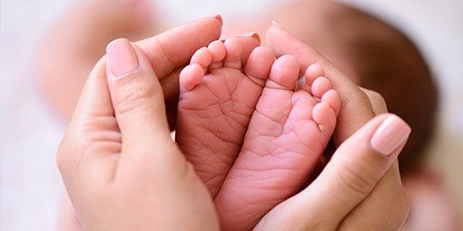 Baby's Small Feet — Elko, MN — Treasured Birth LLC